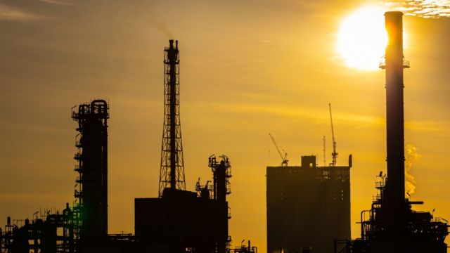 Silhouette of oil and gas refinery industry plant