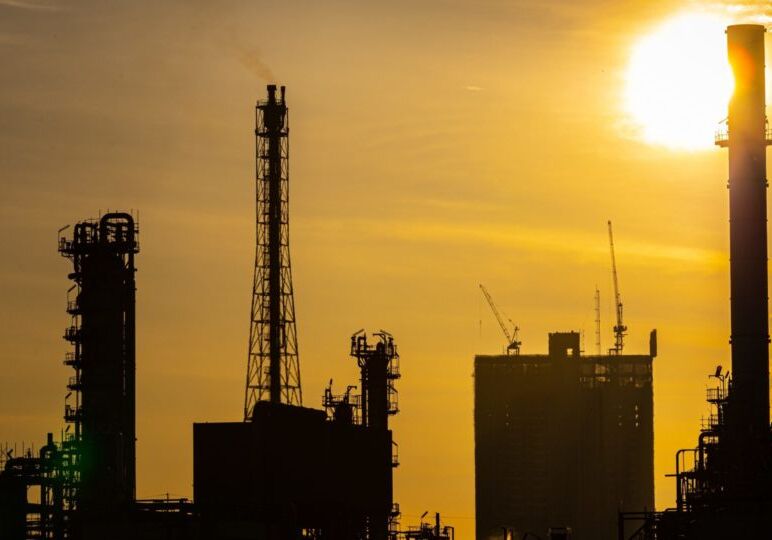 Silhouette of oil and gas refinery industry plant